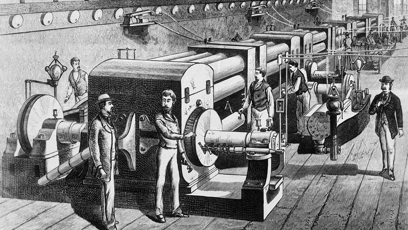 Old photo of large dynamos and steam machinery inside Edison's Pearl Street station